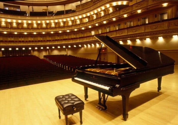 Rental piano on stage in an auditorium for a concert